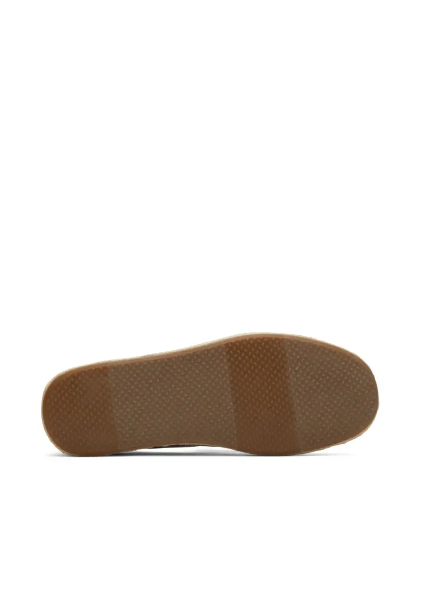 Toms | Santiago.