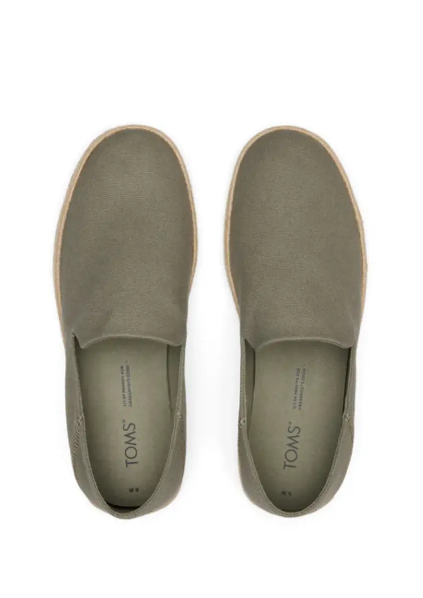Toms | Santiago.
